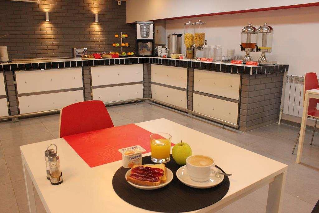 Chisto Hotel โกเมล ร้านอาหาร รูปภาพ